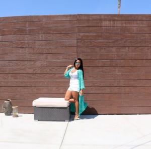 Tanya Major wearing Bebe Kimono, Gap tank, white denim shorts and Stuart Weitzmen high heels