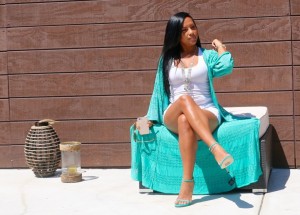 Tanya Major wearing Bebe Kimono, Gap tank, white denim shorts and Stuart Weitzmen high heels