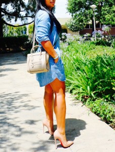 Tanya Major wearing: H&M Denim Dress, Christian Louboutin So Kate pumps, Celine bag and shades