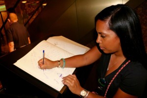 Signing the book at Harrods memorial