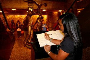 Signing the book at Harrods memorial