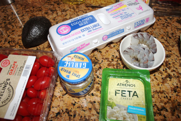 eggs, feta cheese, garlic, shrimp and tomatoes