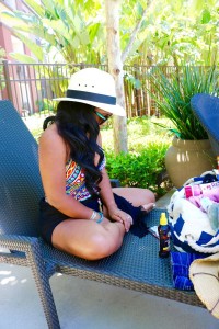 Tanya Major in Trina Turk bathing suit, Valentino Shades and a Fedora Hat