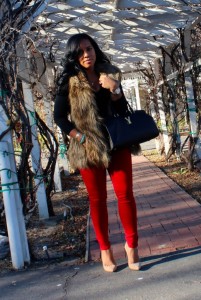 Wearing - fur vest, V-neck sweater, red jeans, Jimmy Choo Pumps, YSL Bag