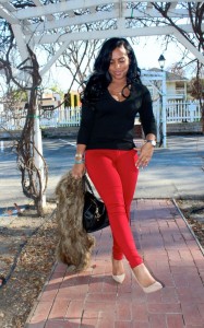 Wearing - fur vest, V-neck sweater, red jeans, Jimmy Choo Pumps, YSL Bag